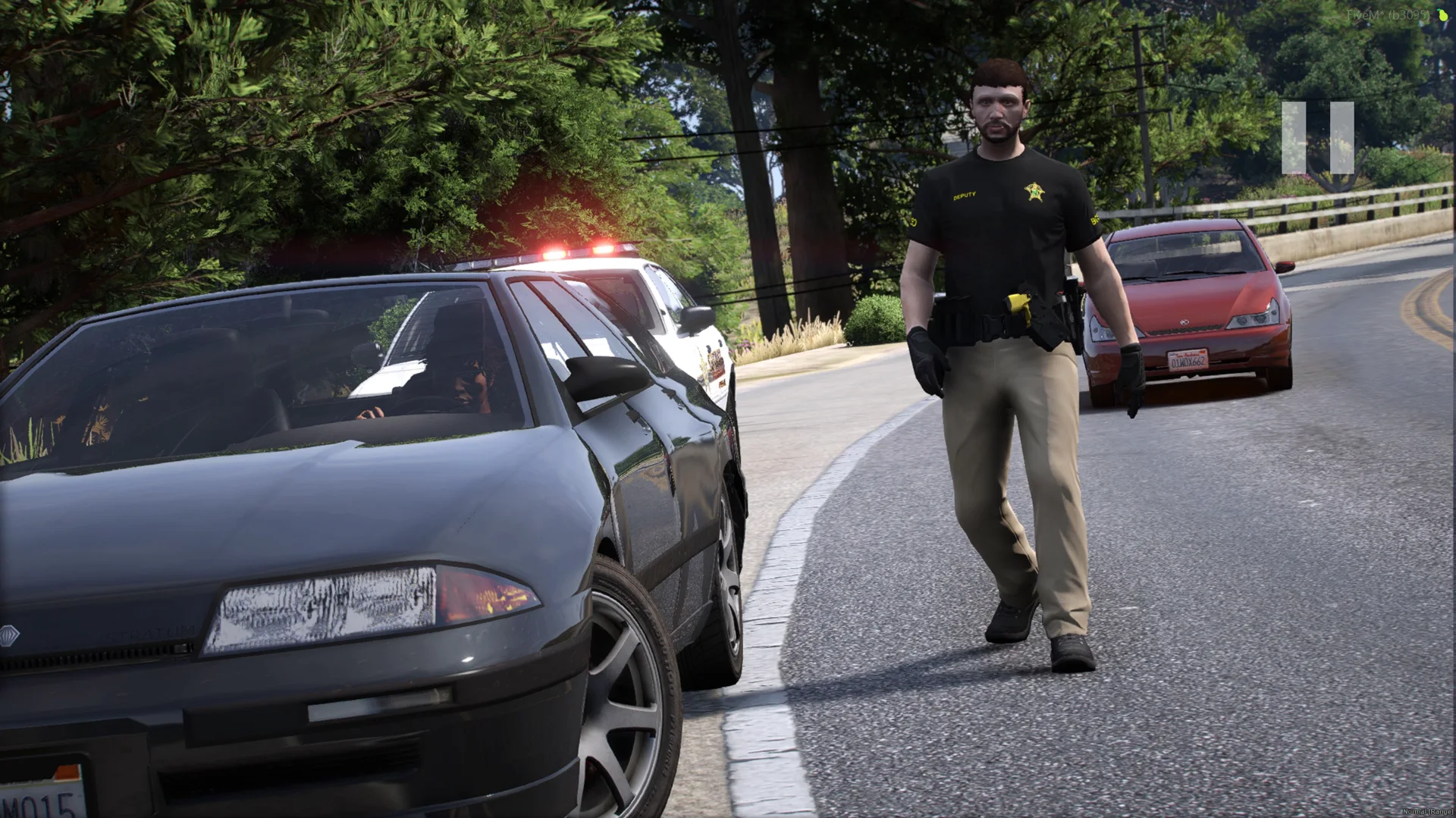 A deputy on foot patrol beside a marked sheriff's vehicle on a county road